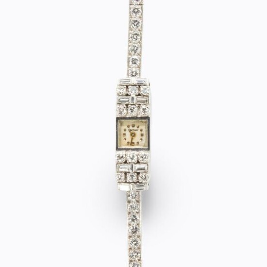 A Retro diamond and platinum bracelet watch, Cartier
