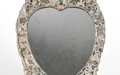 A Rococo Style Silver Mirror