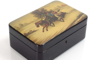 A Russian black lacquer box decorated with figures on horseback...