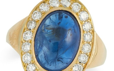 A SAPPHIRE AND DIAMOND CLUSTER RING set with a cabochon