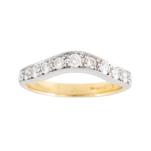 A SHAPED DIAMOND HALF ETERNITY BAND, mounted in 18ct yellow ...
