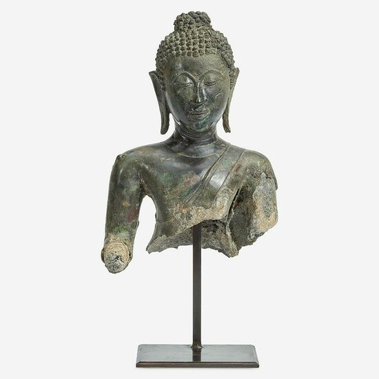 A Thai bronze head and torso of a Buddha 15th Century