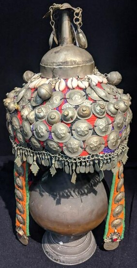 A Tibetan headdress, decorated with shells bells, metal