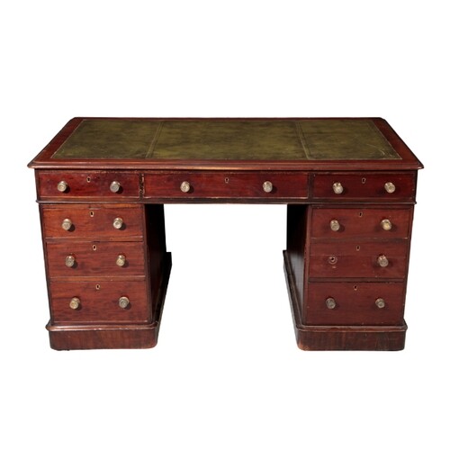 A VICTORIAN MAHOGANY PEDESTAL DESK late 19th century, with a...