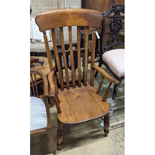 A Victorian elm and beech Windsor lathe back armchair, width...