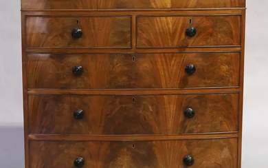 A Victorian mahogany bow front chest, third quarter 19th century, with three frieze drawers...