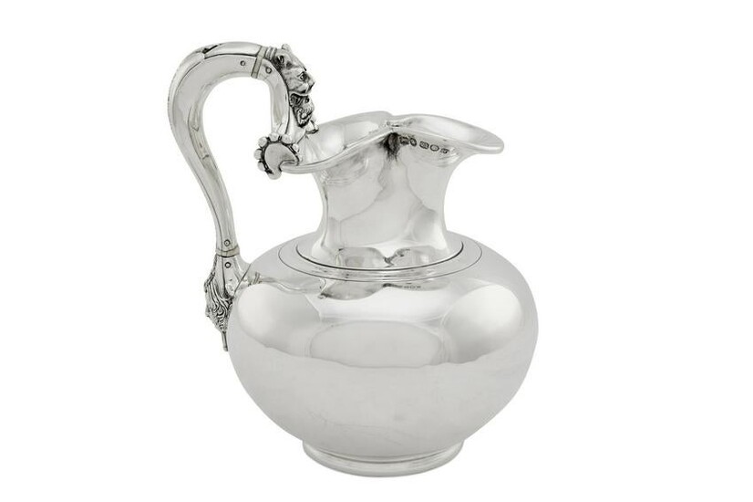 A Victorian sterling silver oinochoe form jug