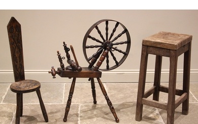 A Welsh spinning wheel, probably fruit wood, 19th century, t...