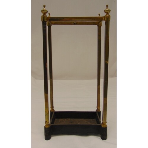 A brass and metal rectangular umbrella and stick stand on fo...