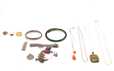 A collection of gold, silver and costume jewellery.