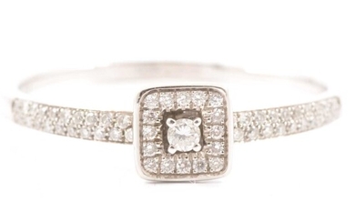 A diamond halo ring.