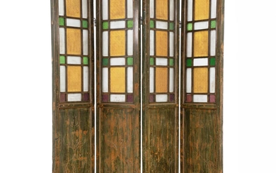 A four winged screen, green painted with coloured glass. 20th century. H....
