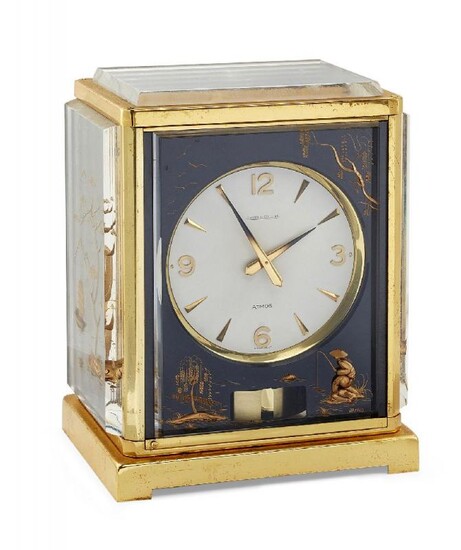 A gilt-brass and plexiglass Atmos 'Marina' clock...