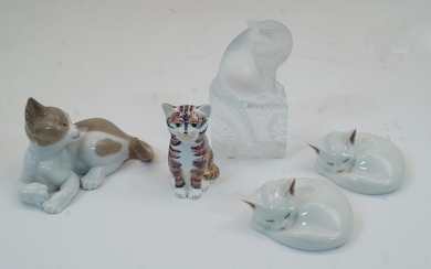 A group of ceramic and glass cats, to include a modern Lalique frosted glass cat sat atop a rectangular base with vine motifs, engraved 'Lalique R France' to the underside, 13.5cm high, a Royal Crown Derby paperweight cat, with silvered stopper...