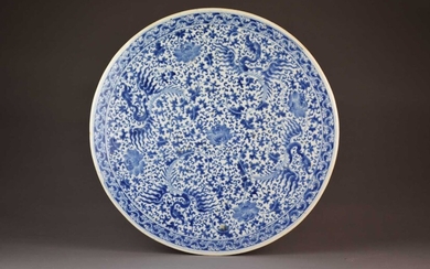 A large Chinese blue and white circular plaque or table top, 19th century