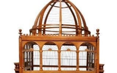 A large and impressive cherry wood birdcage,...