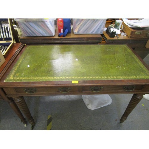 A late 19th century Maple & Co mahogany writing table with a...