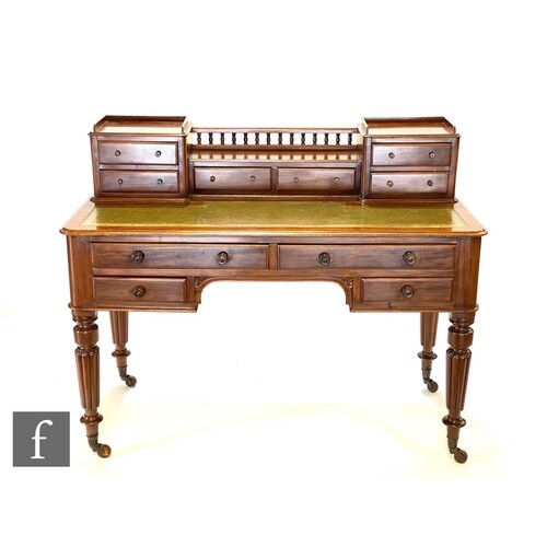 A late 19th to early 20th Century mahogany writing desk by E...