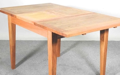 A modern light oak draw leaf dining table 148w x...