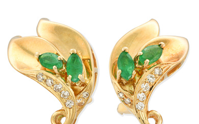 A pair of 18k gold earrings with diamond and marquise cut emerald.