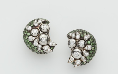 A pair of American 18k gold Sterling silver tsavorite and diamond clip earrings.