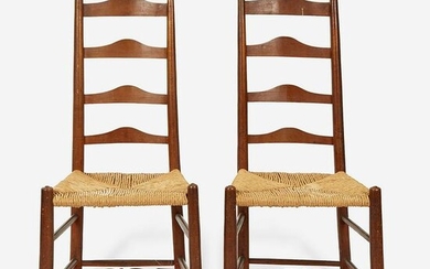 A pair of carved and turned maple ladder-back side