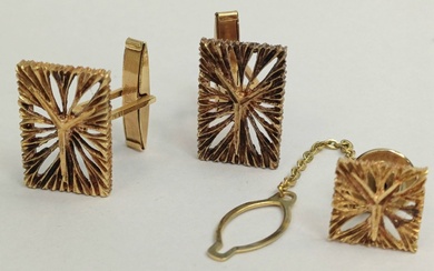 A pair of gold cufflinks and tie clip, made...