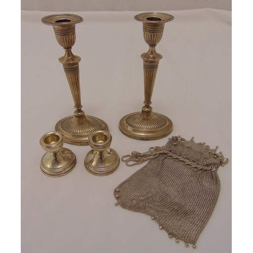 A pair of hallmarked silver table candlesticks, Birmingham 1...