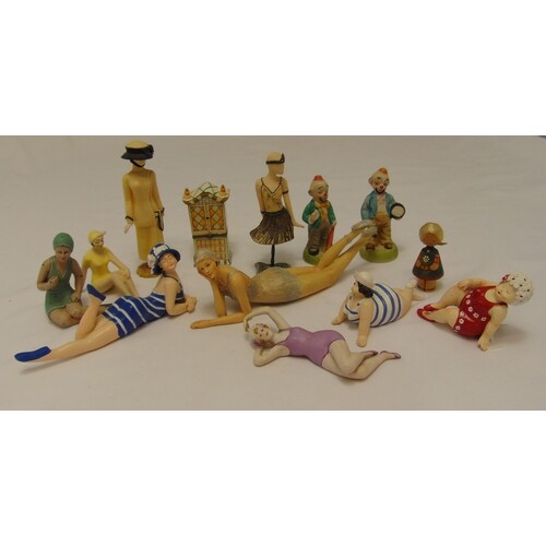 A quantity of collectable miniature dolls of varying size an...