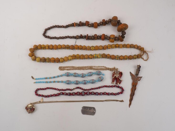 A quantity of costume jewellery, 20th century and later, to include: dog tags, impressed 'JAMES R QUARRY, 33494441 T-44 B', hardstone beads, cufflinks, necklaces, bracelets, broaches and others (a lot) Please note: the image illustrates only...