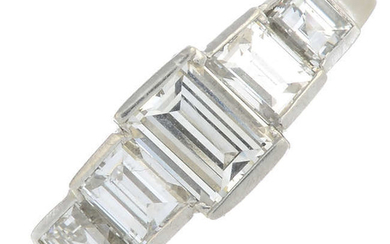 A rectangular-shape diamond graduated five-stone ring.