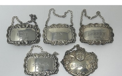 A set of four Elizabeth II silver spirit labels, Port, Gin, ...