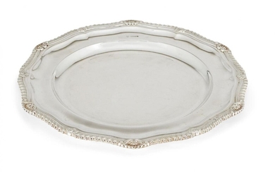 A set of twelve silver plates, Sheffield, c.1966, CJ Vander, of shaped, circular form, each designed with gadroon and shell border, 29.5cm dia., total weight approx. 263oz (12)