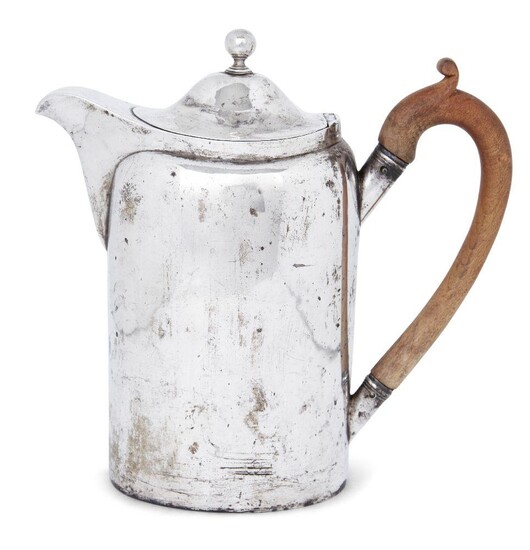 A silver coffee pot by Paul Storr, London, 1798, of plain, oval form with wooden handle and hinged cover mounted by a spherical finial, 21.8cm high, approx. weight 20.8oz Provenance: The estate of the late designer, Anthony Powell.
