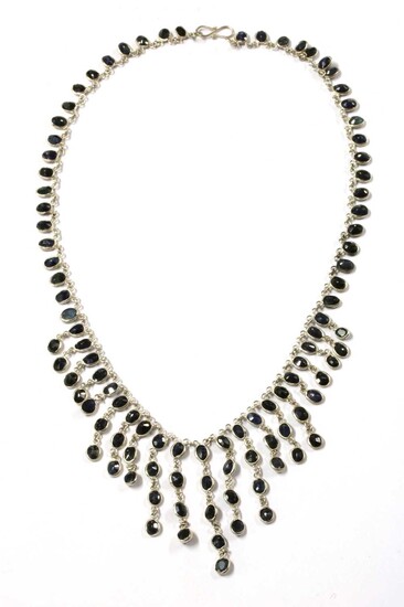 A silver sapphire fringe necklace