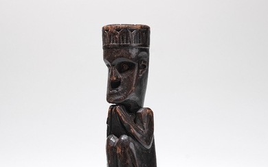 A small seated Batak ancestor figure.