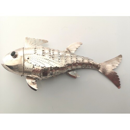 A sterling silver reticulated fish. Probably continental sta...