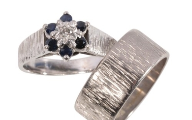 AN 18CT SAPPHIRE AND DIAMOND CLUSTER RING AND MATCHED WEDDIN...