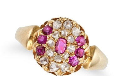 AN ANTIQUE RUBY AND DIAMOND CLUSTER RING in yellow gold, set with a cushion cut ruby in a cluster of