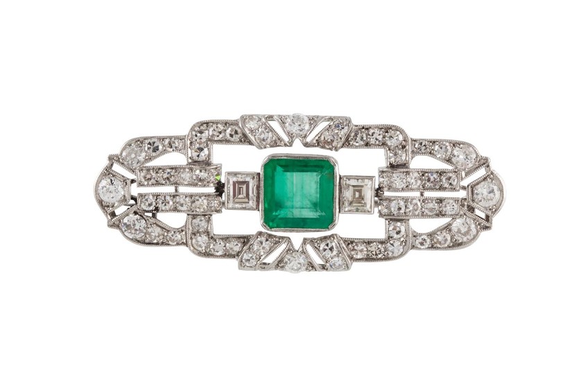 AN ART DECO EMERALD AND DIAMOND BROOCH, boxed, with one squa...