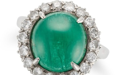 AN EMERALD AND DIAMOND CLUSTER RING set with a round cabochon emerald of approximately 5.35 carat...