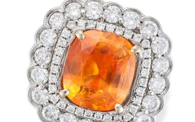 AN ORANGE SAPPHIRE AND DIAMOND CLUSTER RING in 18ct white gold, set with a cushion cut orange
