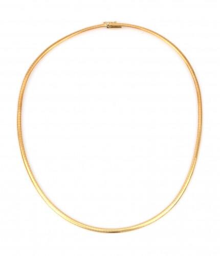 An 18 karat gold omega necklace. Composed of flat curved links to a tongue clasp. Provenance: Italy. Gross weight: 24.4 g.