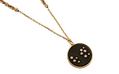 An 18K pendant and chain with black onyx