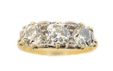 An 18ct gold diamond three stone ring