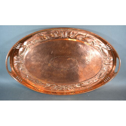 An Arts and Crafts Newlyn Copper Tray of oval pierced form, ...