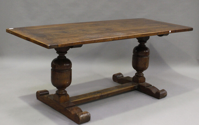 An early 20th century Jacobean Revival oak refectory table, on turned baluster supports, height 75cm