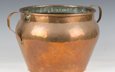 An early 20th century copper jardinière with scroll handles, height 26cm, width 46cm, together