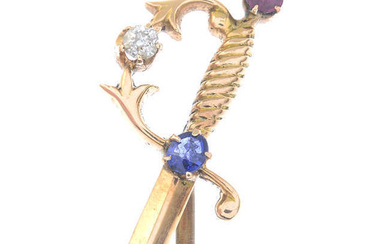 An early 20th century sapphire, ruby and diamond sword stickpin.