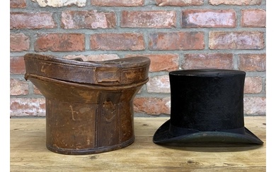 Antique black silk top hat by Bennet's of London, held withi...